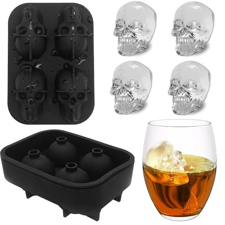 Black silicone mould for creating skull-shaped ice cubes, featuring detailed clear ice skulls and a glass of whiskey with a skull ice cube. Perfect for adding a unique touch to beverages.