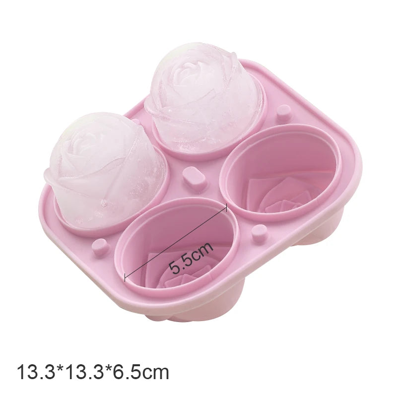 Pink silicone mold with rose-shaped cavities for creating large 5.5cm 3D rose ice cubes, measuring 13.3x13.3x6.5cm.